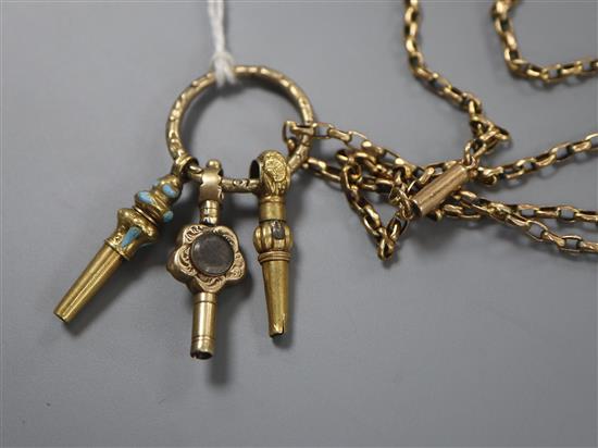 An early 20th century 9ct chain, hung with three assorted watch keys.